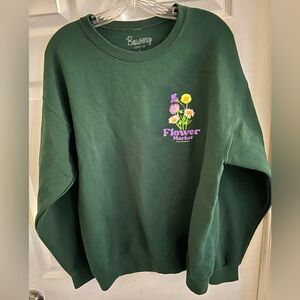 Green crewneck sweatshirt with embroidered flower design #flowerpower